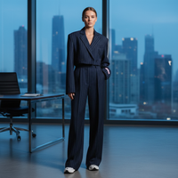 Annett | Gestreepte damespakset met elegante blazer en wijde broek
