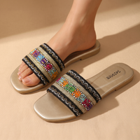 Delany | Comfortable slippers with woven uppers and embroidered details