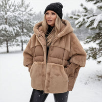 Amara | Gesteppte Pufferjacke mit Oversize-Passform und weicher Kunstfellkapuze