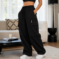Elena | High-waisted wide-leg cargo pants with striking zippers