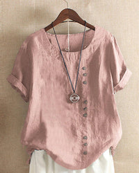 Dorothé | Elegant linen top with classic round neckline and decorative buttons