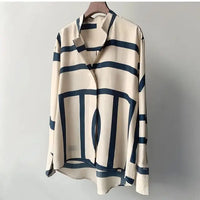 Seidenbluse mit geometrischem Print