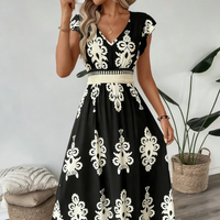 Safiya | Elegant geometric midi dress with A-line