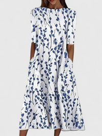 Noa | Elegantes und luftiges Midikleid mit Blumenmuster
