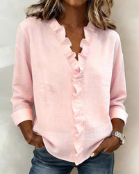 Jennifer | Romantic blouse with an elegant V-neck and delicate ruffles