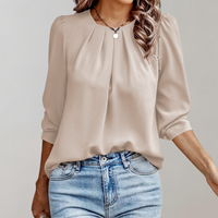 Lena | Blouse unique avec plis et manches bouffantes