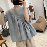 Blusa de algodón y lino elegante para un look veraniego a la moda