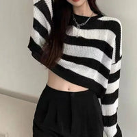 Naira | Suéter de punto de rayas oversize para mujer | Blanco
