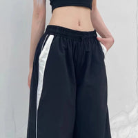 Pantaloni a Gamba Larga di Elegance Flair