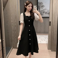 Elegante Zomerse Midi Jurk van Vintage Flair