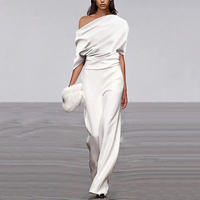 Noelle | Mono elegante de un solo hombro con corte fluido